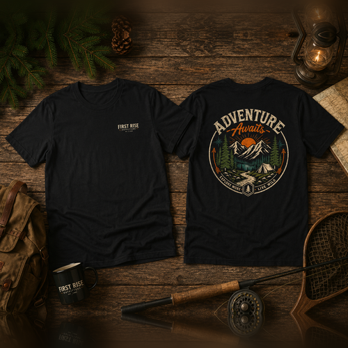 Adventure Awaits vintage camping tee, flat-lay on weathered wood with outdoor gear