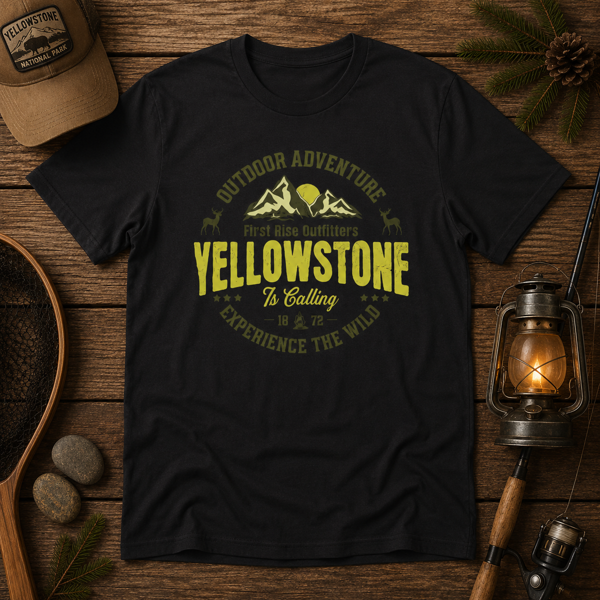 Yellowstone Is Calling tee, flat-lay styled with outdoor gear