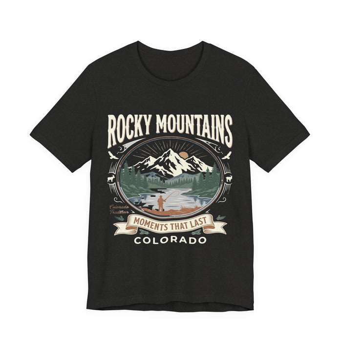 Black heather Rocky Mountains Colorado fishing tee with oval scene of a fly angler casting below a snow-capped peak