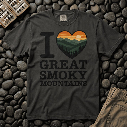 Dark charcoal I Heart Great Smoky Mountains tee on river stones with sunset mountain heart graphic