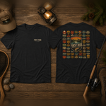 National Parks fishing tee, front and back, flat-lay on weathered wood with a lantern, landing net, fly rod and boots — thumbnail 1